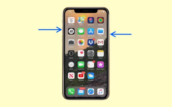 Pressing the Side and Volume Up buttons on an iPhone to take a screenshot.