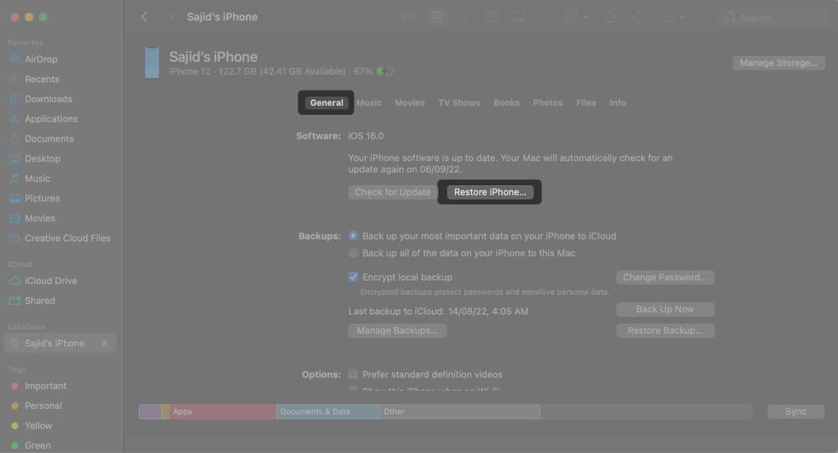 Select the General tab and select the Restore iPhone in Mac Finder