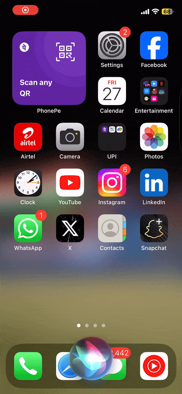 Using Siri to take a screenshot on an iPhone.