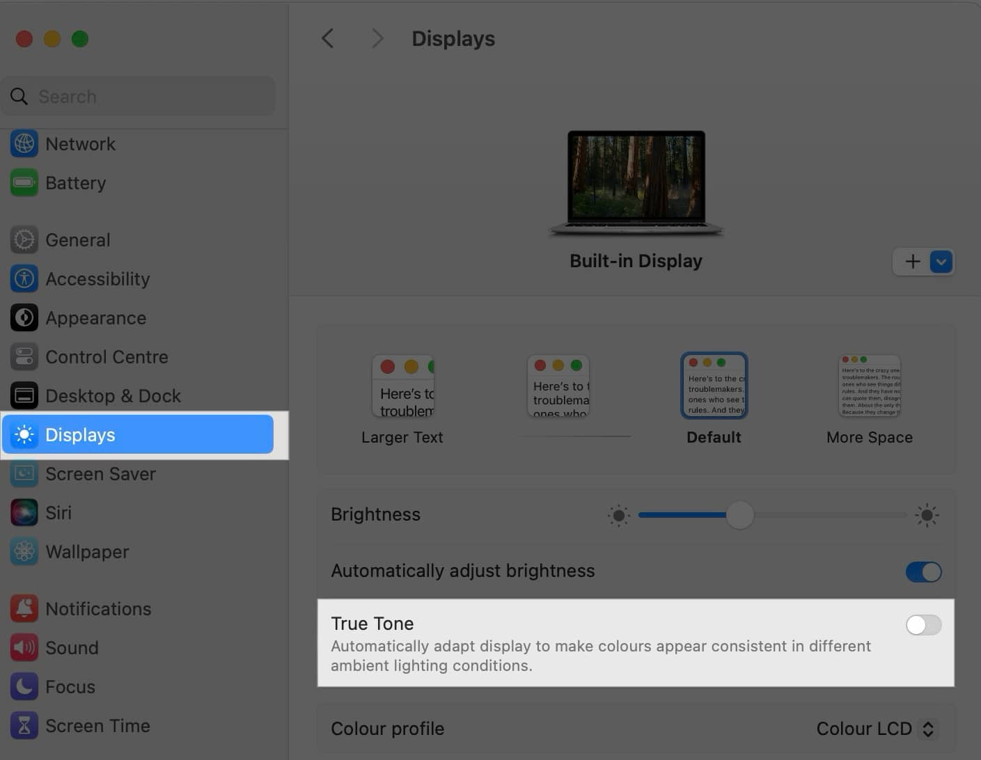 Disabling the True Tone display setting in Mac System Settings.