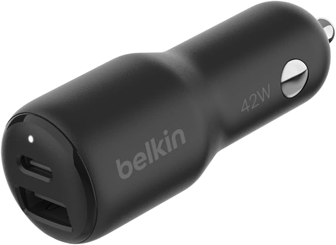 A Belkin car charger for an iPhone.