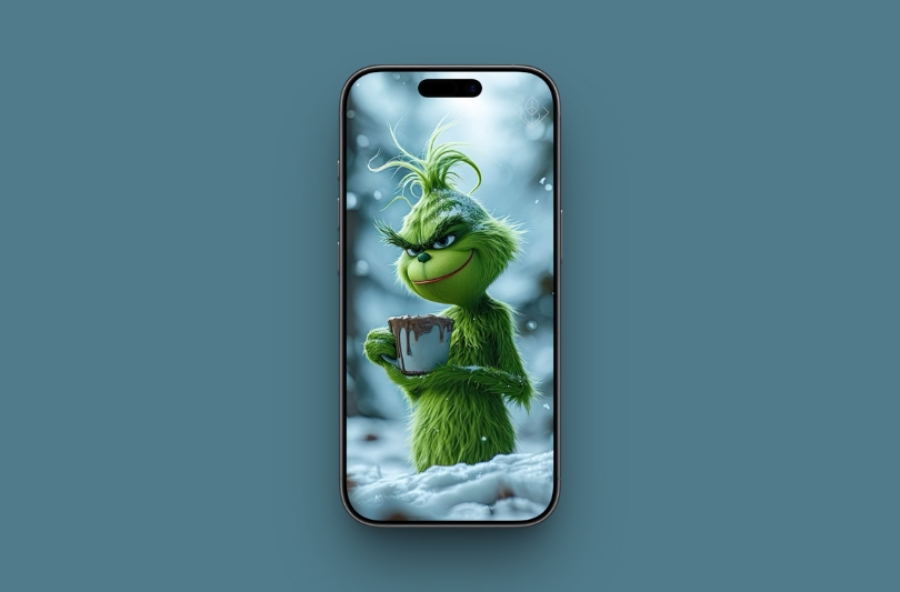 15 Cute and Funny Grinch iPhone Wallpapers in 4K: Free Download – iGeeksBlog Grinch Holding a Coffee Mug