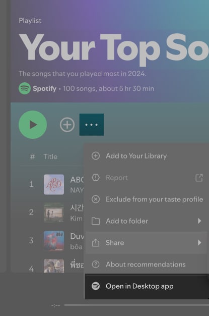 Open in Desktop app option to open a playlist in the Spotify app on a Mac.