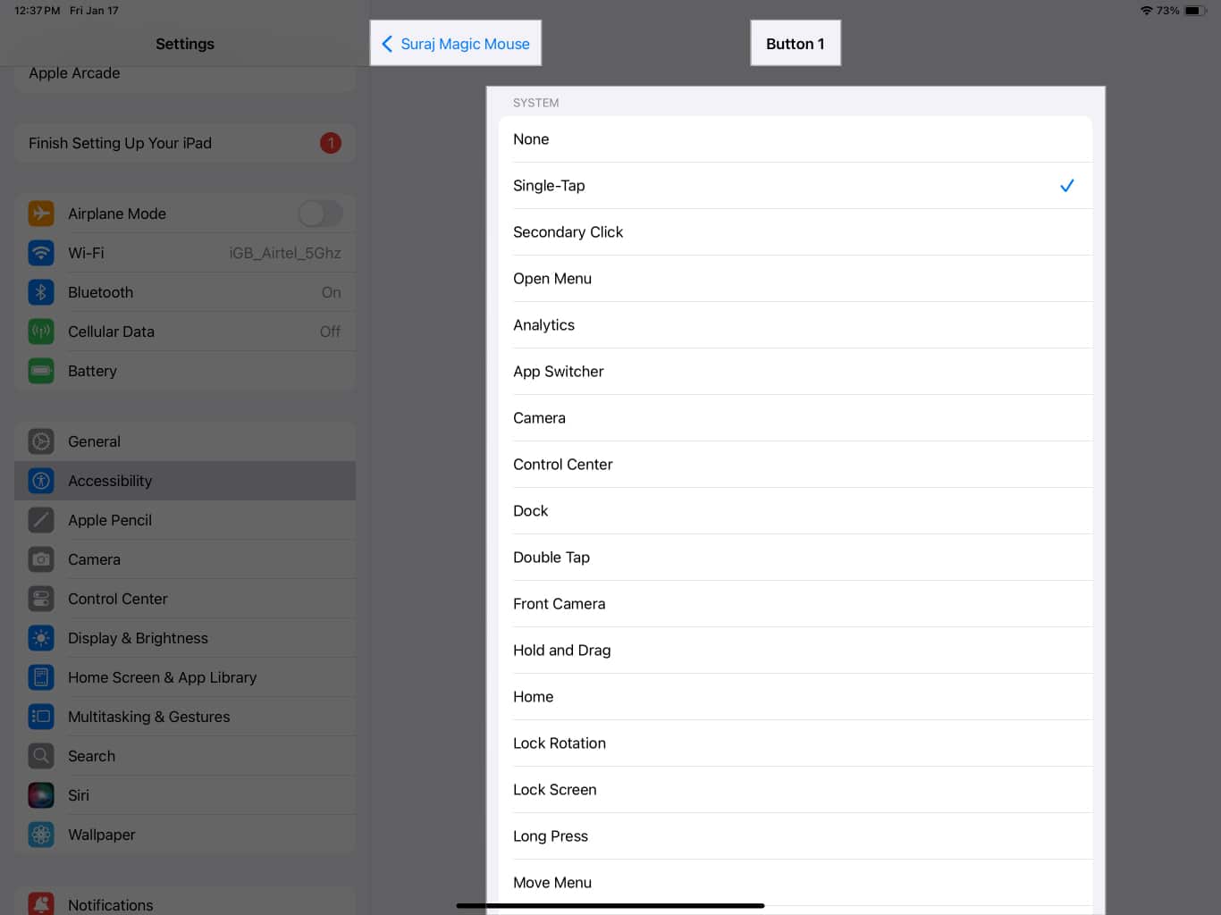 Assigning an action for mouse button in iPadOS Settings app.