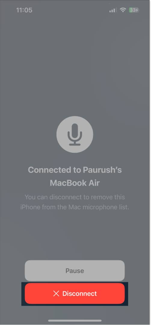 Disconnecting iPhone from the connected MacBook.