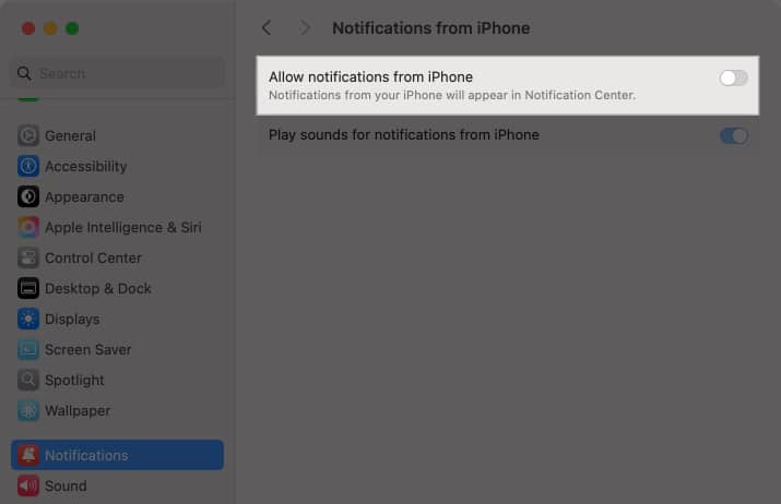 Toggling off the Allow Notifications from iPhone option in the System Settings app on a Mac.