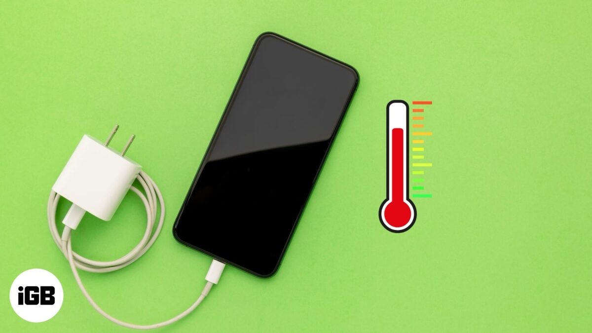 An iphone connected to a charger