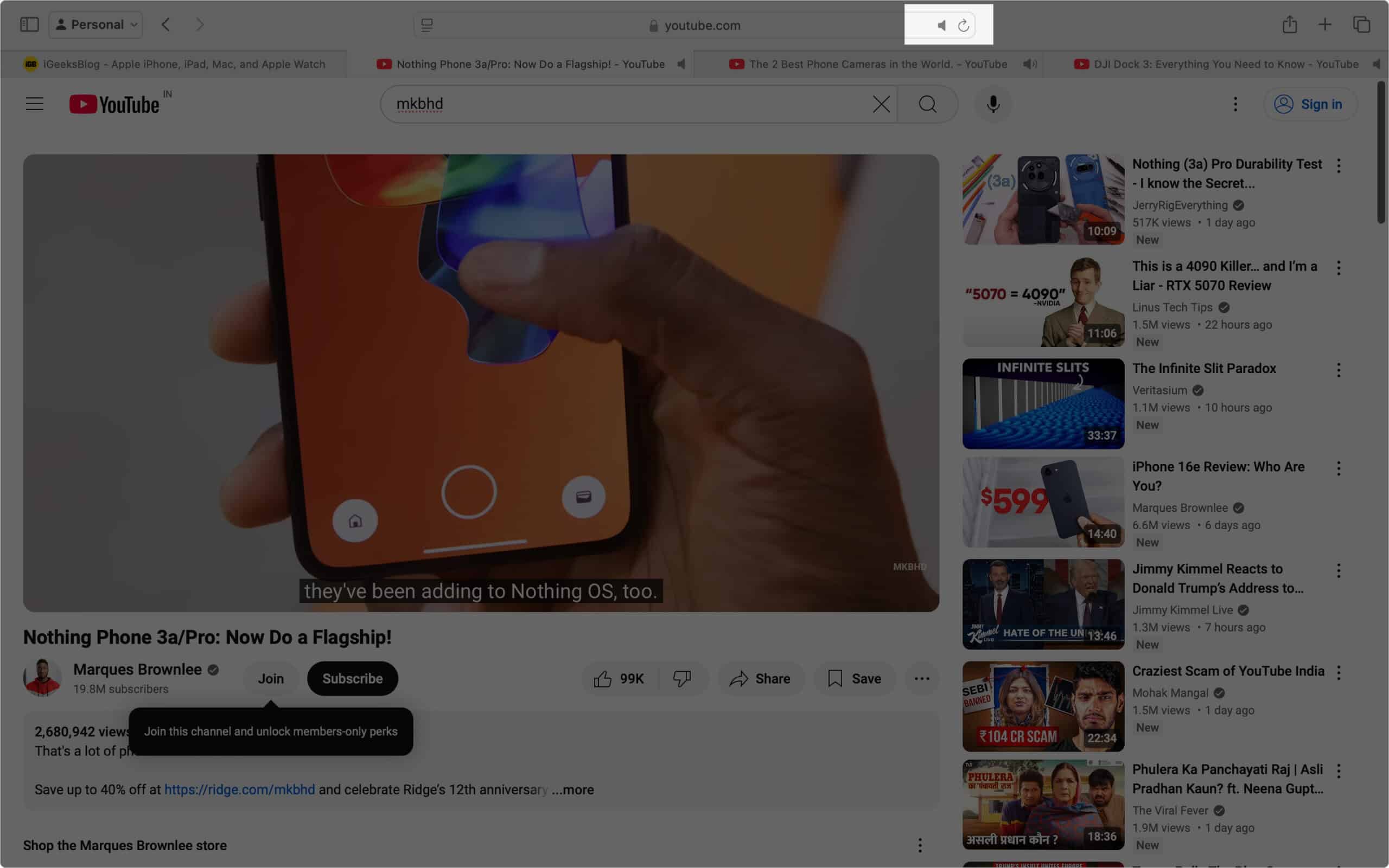 Using the Mute Other Tab option to mute the other Safari tab playing audio.