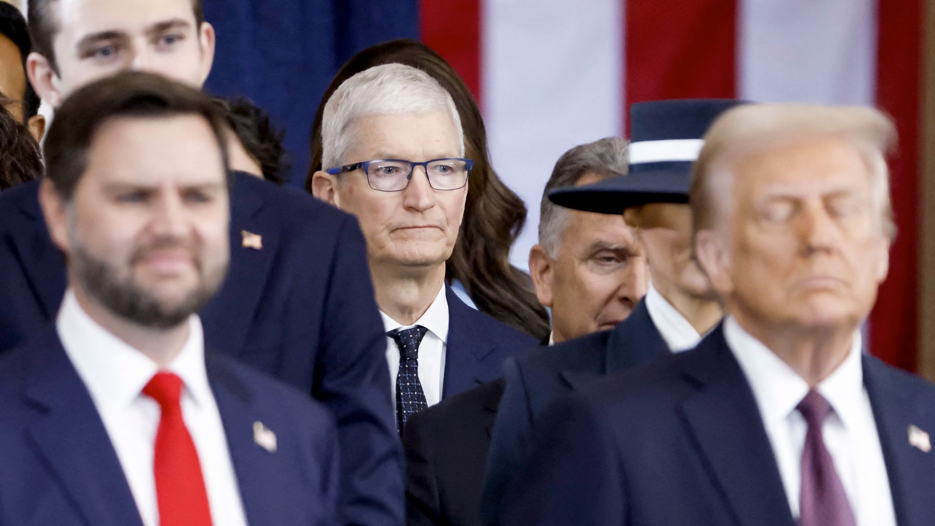 Apple CEO Tim Cook at 2025 US presidential inauguration with Trump and JD Vance.