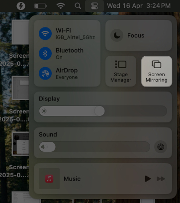 Accessing the screen mirroring option in the control center on a mac