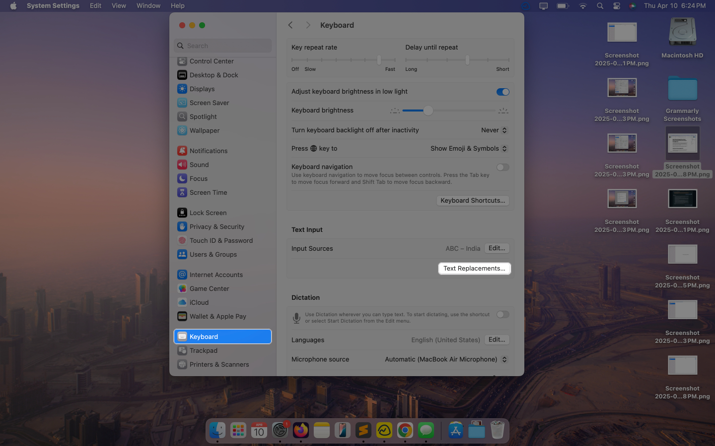 Accessing the text replacement option in macos system settings app