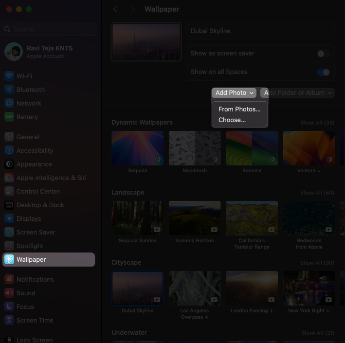 Accessing the add photo button options on the wallpaper settings page in macos system settings app