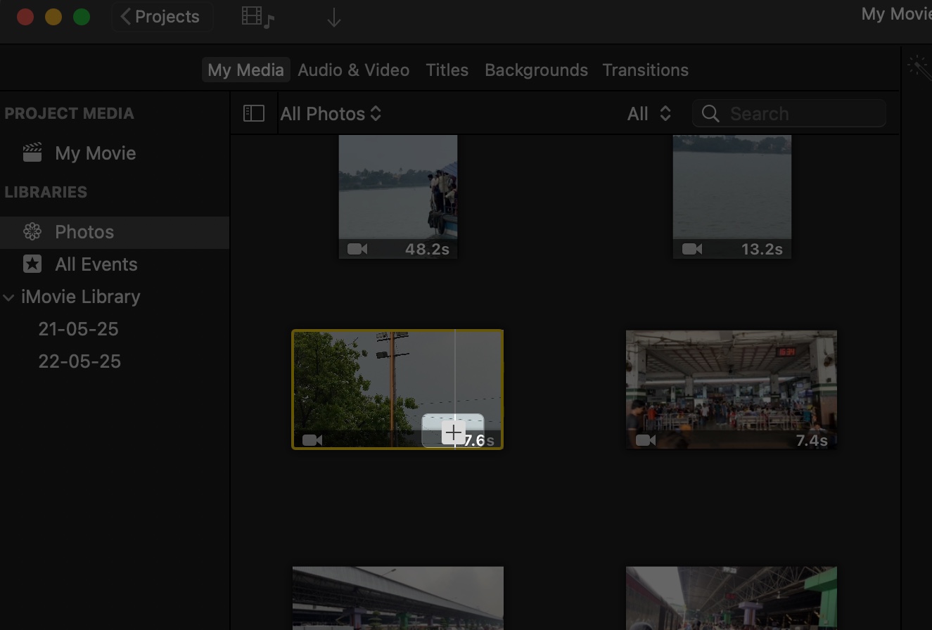 Access album and select plus sign to add photo or video in imovie on mac