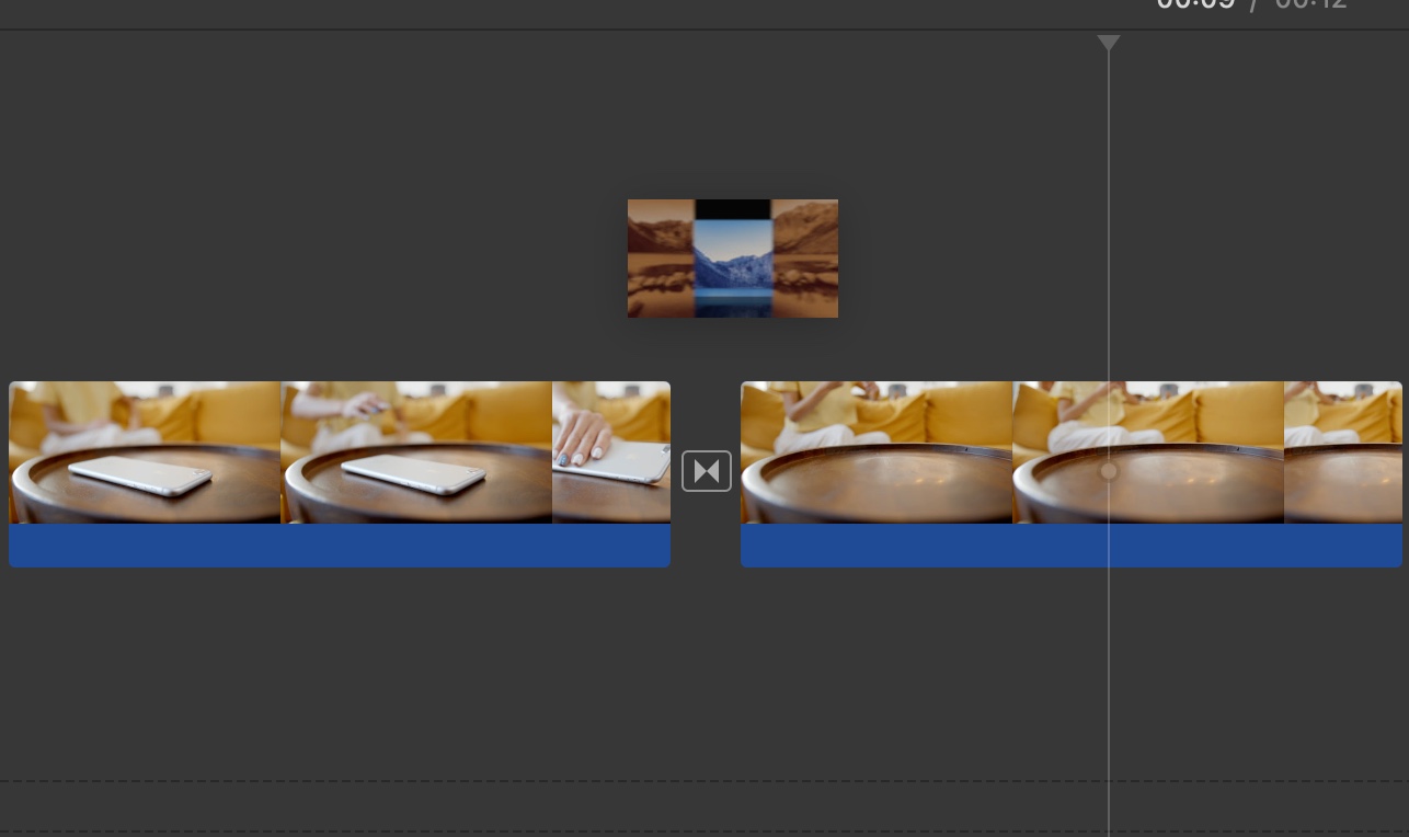 Drag the transition between clips on imovie in mac