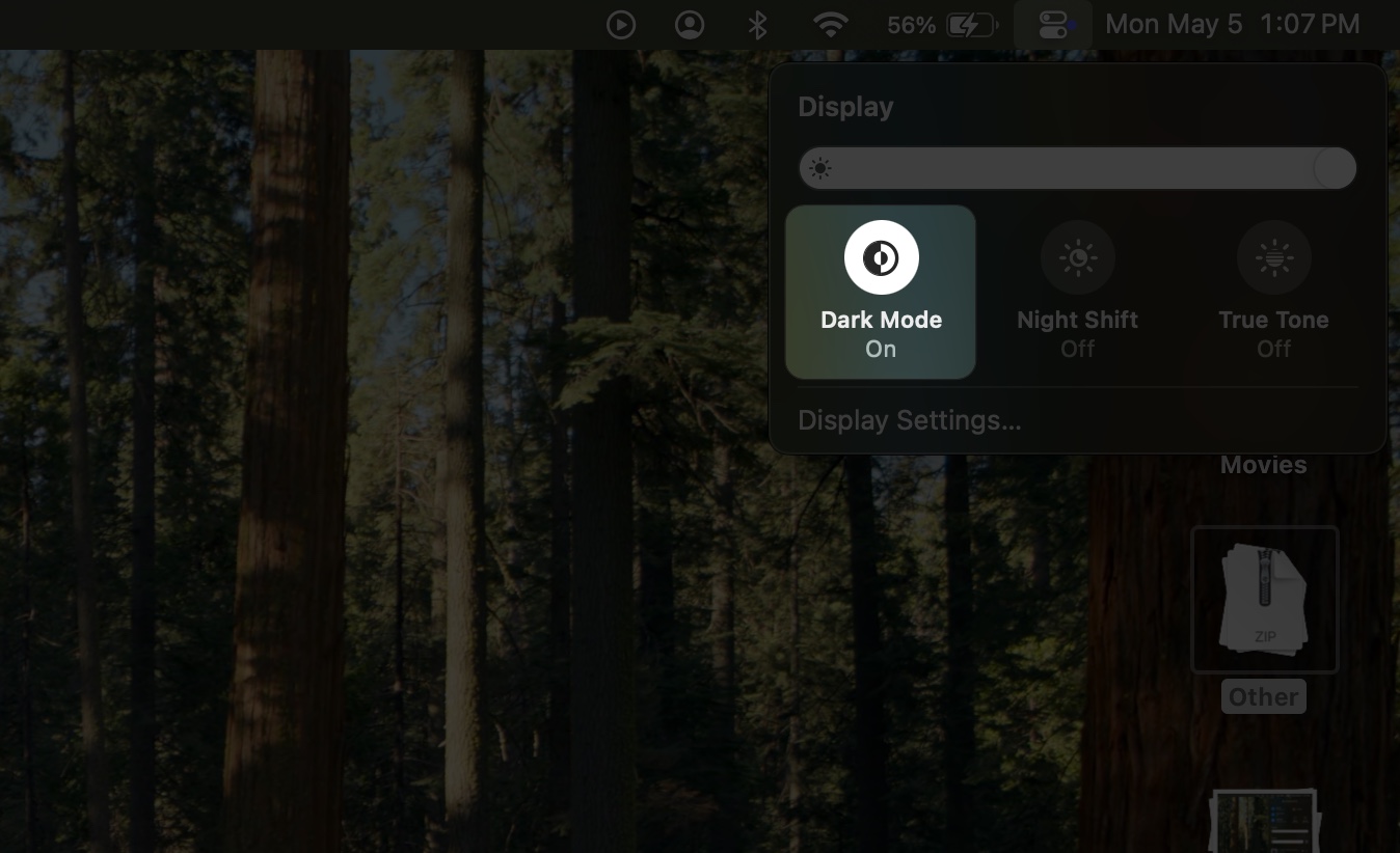 Clicking the dark mode icon in control center on a mac
