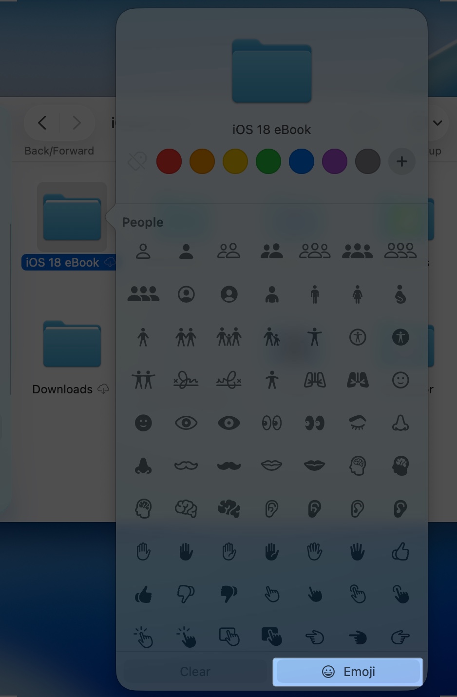 Click emoji button at bottom on macos 26