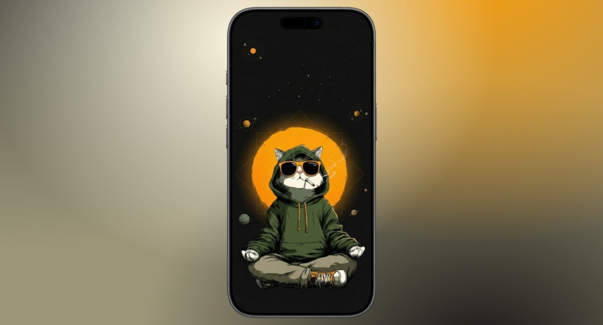 Cartoon cat in a green hoodie and sunglasses meditating on a smartphone wallpaper with an orange halo in a space scene.