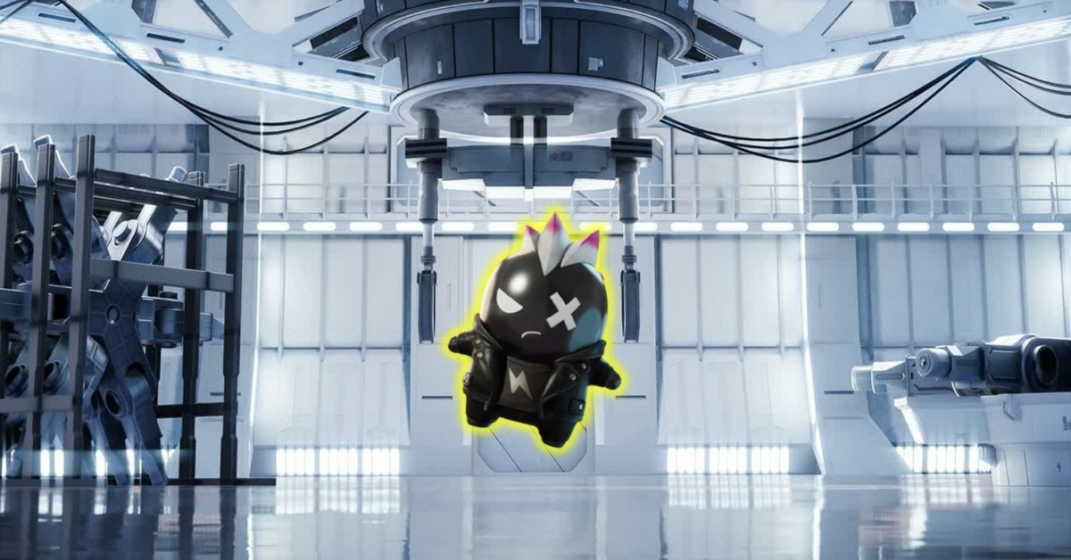 Cartoon black bomb character with a mohawk and leather jacket suspended from a robotic arm in a futuristic lab.