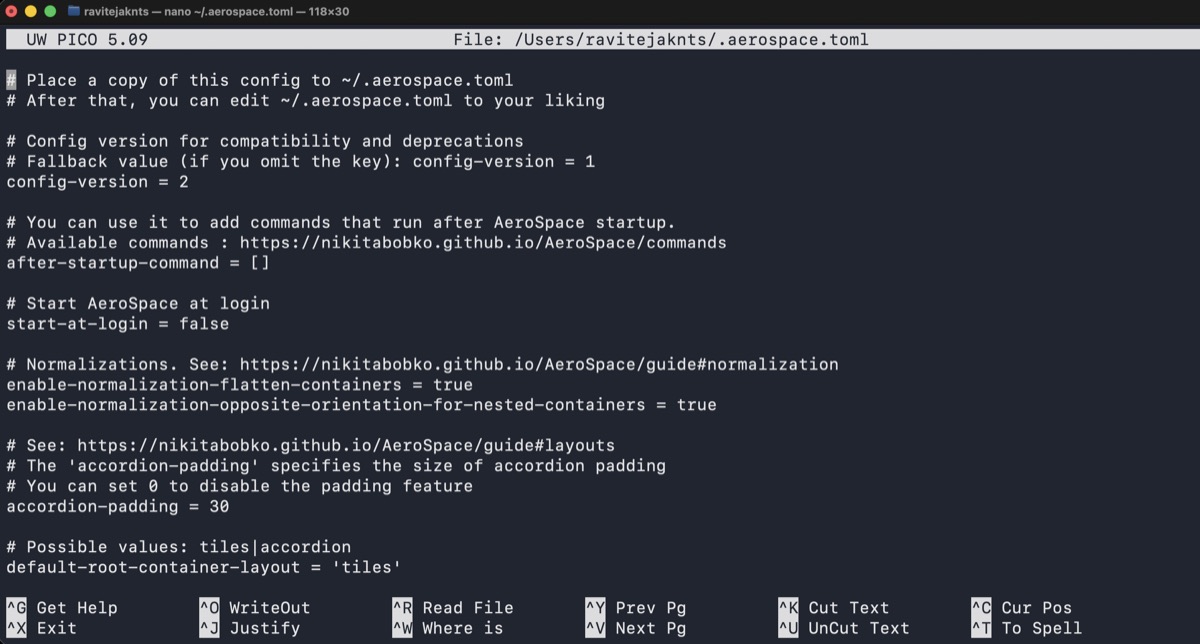 AeroSpace config file open in nano showing startup and layout settings