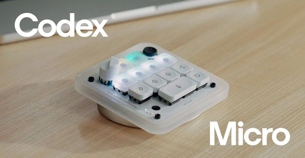 OpenAI Codex Micro desktop keypad on a wooden desk