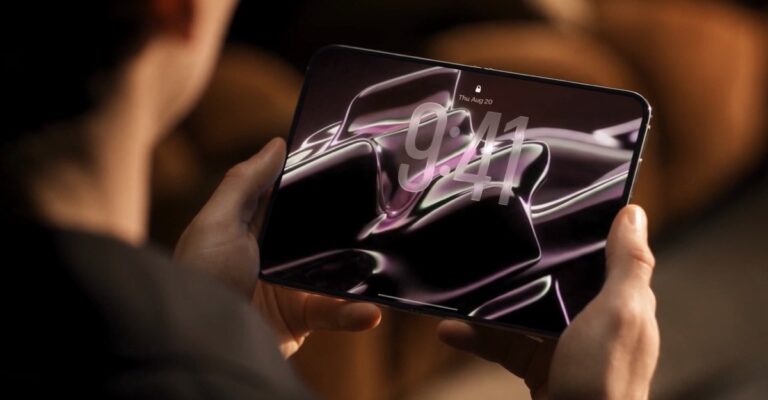 Person holding the open foldable iPhone Ultra concept shown in Gunho Lee's video