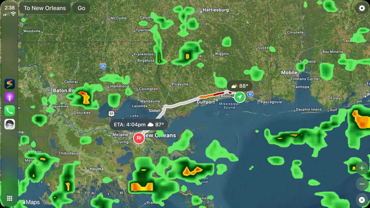 Storm Radar adds route-aware weather alerts to Apple CarPlay – iGeeksBlog Storm Radar CarPlay interface showing a weather map, route, ETA, and rain alerts