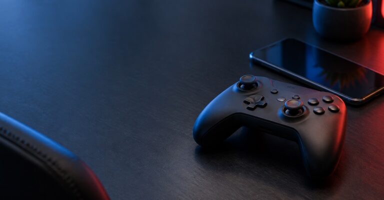 Concept illustration of a generic game controller beside a smartphone