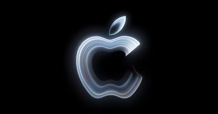 Glowing white Apple logo on a black background