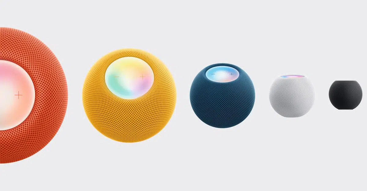 HomePod mini speakers in five colors, shown from above.