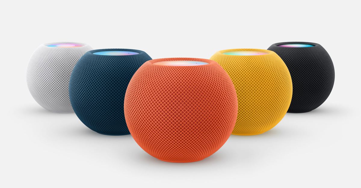 HomePod mini speakers in white, blue, orange, yellow and space gray