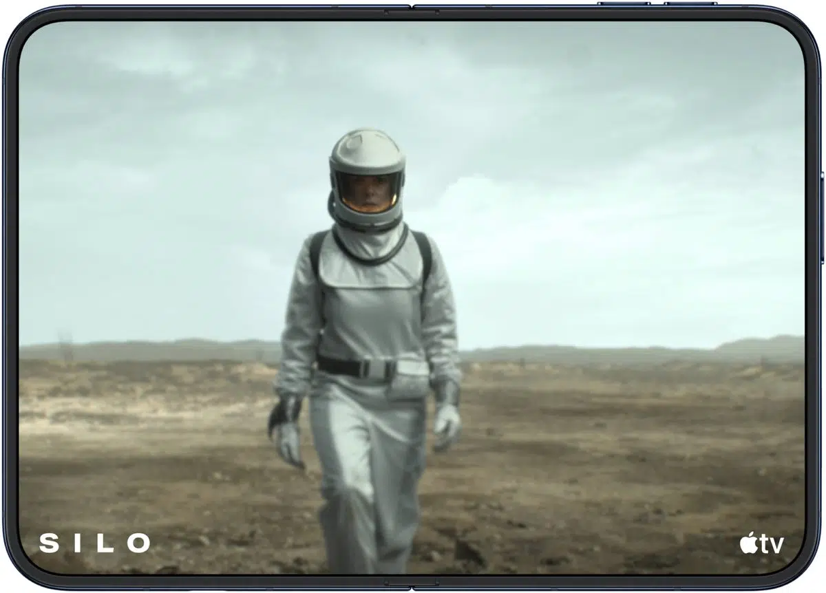 iPhone Duo repair fees: 9 for the inner display, ,499 for other damage – iGeeksBlog The open iPhone Duo in landscape, showing a scene from the Apple TV show Silo on its large inner screen
