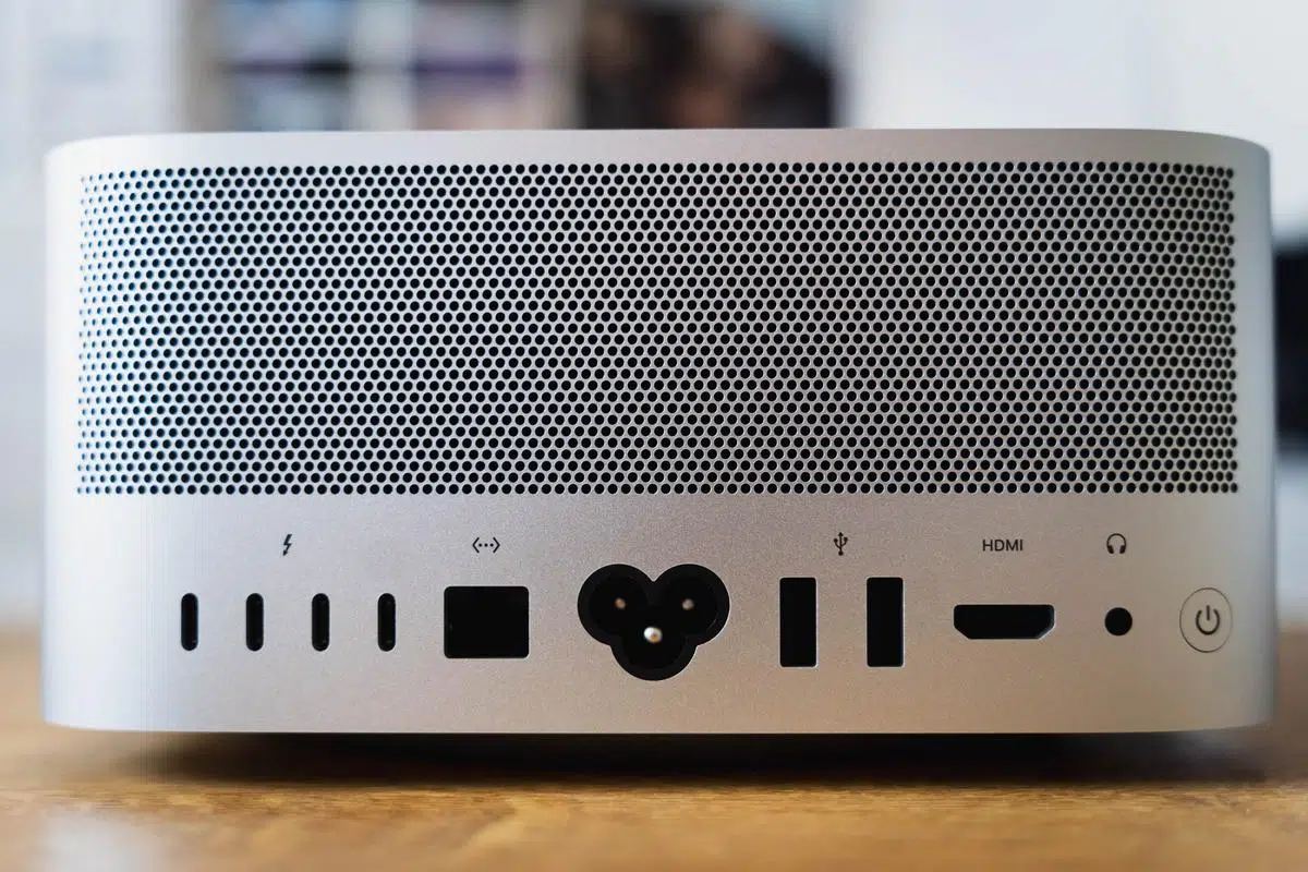 Back of a silver Mac Studio showing its rear ports and ventilation grille