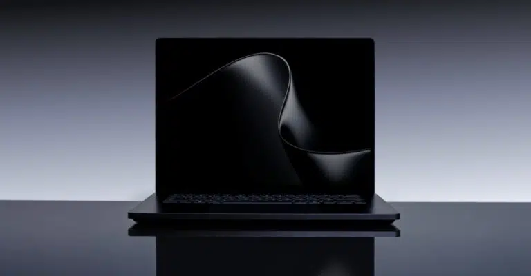Open Surface Laptop Ultra laptop against a dark gray background.